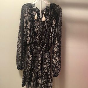 Dress. Black and white pattern with cinched waist. Size 7/8.